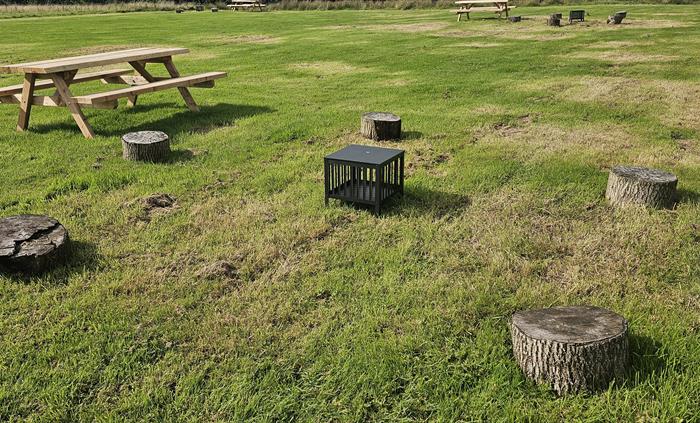 The Redford Cwtch Lounge – a cosy, welcoming space with soft seating, warm lighting, and rustic charm, perfect for relaxing with family or friends aft